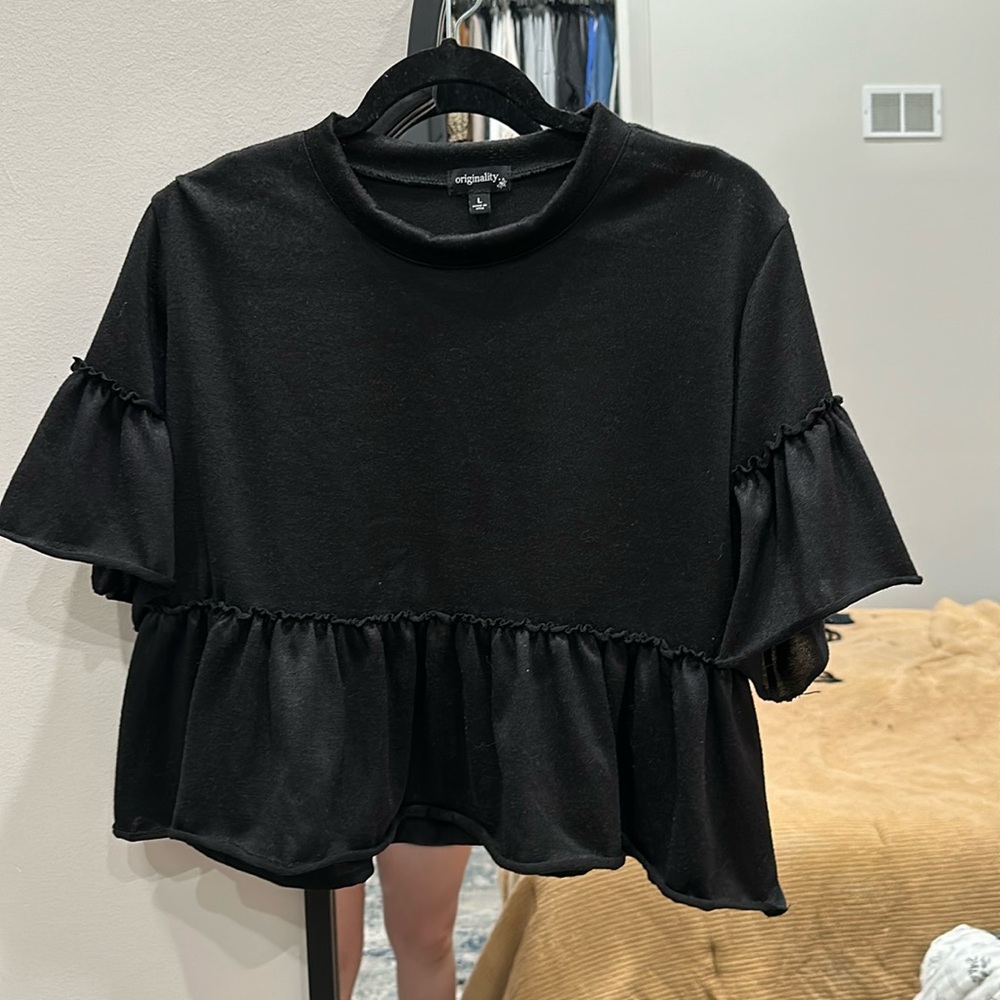 Black crop blouse.